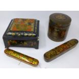 A fine Persian Qalamdan pen box, with sliding compartment to end, painted with vignettes of