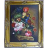 A 20th century still life of flowers, oil on canvas, set in ornate gilt frame, 90 x 60cm