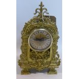 A gilt metal mantle clock, battery operated