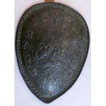 An ancient Greek-style shield with studded and cast allover decoration 60 x 45cm approx