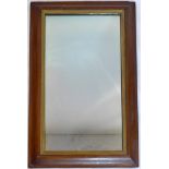 A mahogany wall mirror, with gilt wood inner border, 58 x 93cm