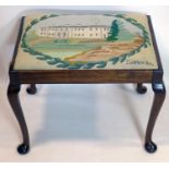 A Georgian style mahogany stool, with tapestry upholstery raised on cabriole legs