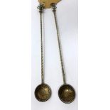 Two Middle Eastern 800 silver coin spoons, with twisted stems and crescent moon and star finial