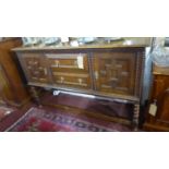 An early 20th century oak sideboard, H.116 W.153 D.52cm