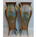 A pair of French marble topped walnut pedestals, with gilt metal mounts and painted canvas panels,