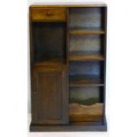 An early 20th century oak bookcase, H.107 W.68 D.21cm