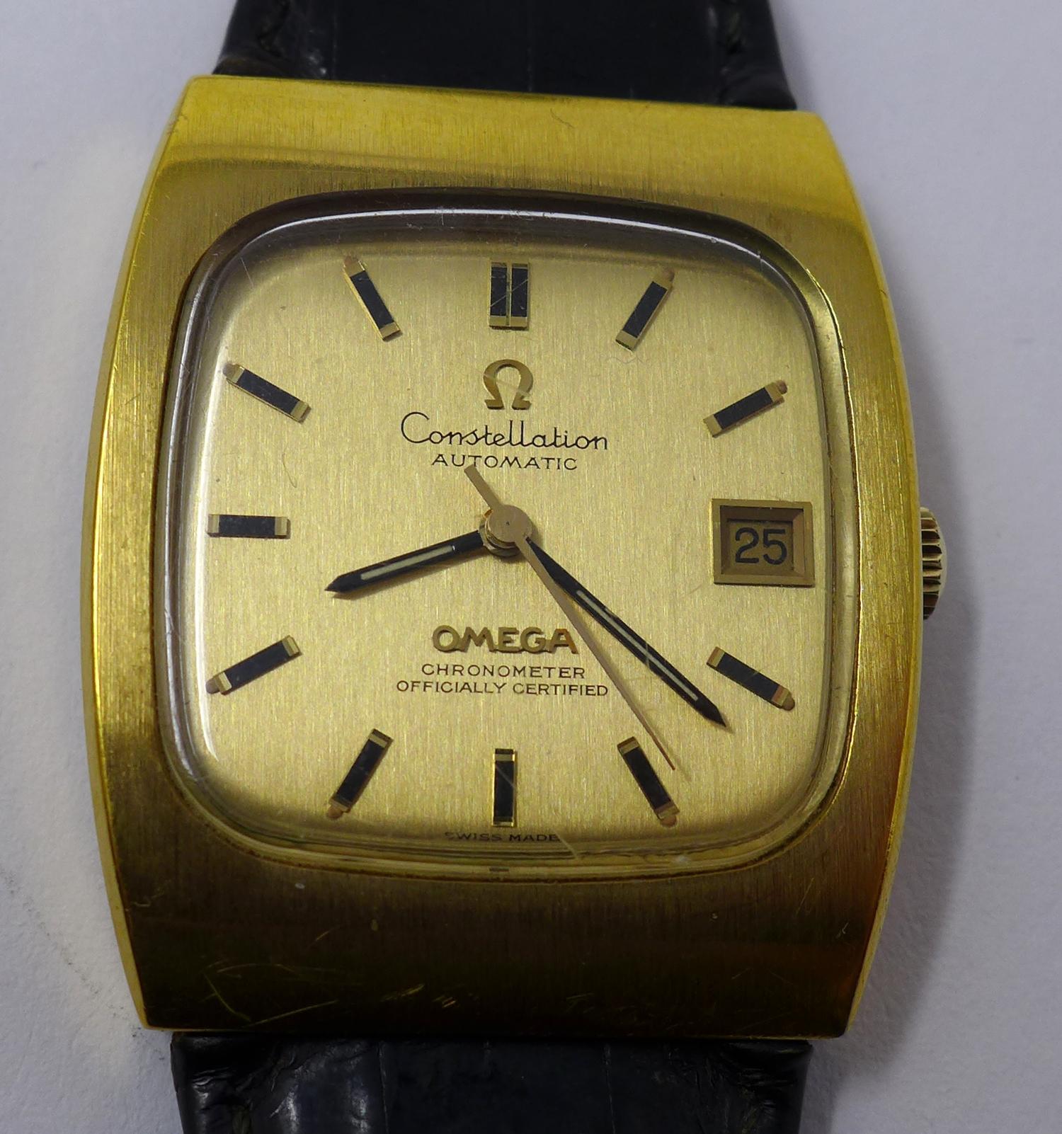 An Omega Constellation automatic chronometer wristwatch, gilt dial with baton markers and date