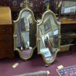 A pair of French gilt metal oblong mirrors, 104 x 52cm