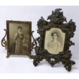 A Victorian cast iron photo frame together with a gilt metal example