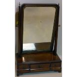 A Georgian mahogany vanity mirror with three drawers raised on bracket feet, H.61 W.40 D.20cm