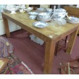 A contemporary teak dining table, H.78 W.180 D.90cm