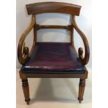 A William IV mahogany scroll armchair