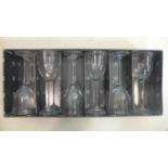 A boxed set of 6 Mario Cioni, Italy, hand-blown large wine glasses, each labelled and engraved on