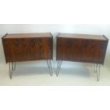 A pair of exotic hardwood side cabinets, with two sliding doors, raised on hairpin legs, H.80 W.88