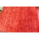 An Indian woolen Gabbeh carpet, red ground, with 100,000 knots, 335 x 245cm