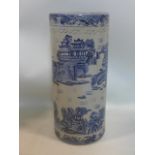 An early 20th century Chinese porcelain stick stand, hand-painted in blue and white with Oriental