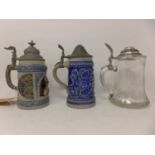A German glass and pewter stein, with etched decoration of a fisherman and stylised flowers, H.19cm,