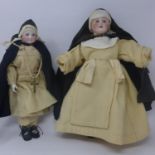 A German bisque nun doll, wearing tunic, cloak and rosary beads, marked '4a' to neck, H.39cm,