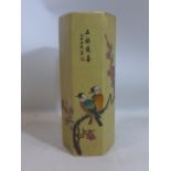 An early 20th century Chinese porcelain brush pot of hexagonal form, decorated with two birds on a
