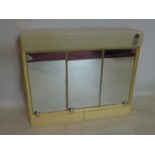 A vintage 3-shelved bathroom cabinet with side light panel to the right hand side of cabinet, 65 x