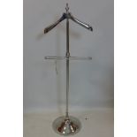 A contemporary chrome gentleman's valet raised on spreading base, H.127 W.42cm