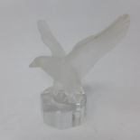 A German Nachtmann frosted glass eagle paperweight, on octagonal clear glass base, H.12cm