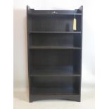 An Arts and Crafts adjustable open bookcase, H.112 W.62 D.22cm