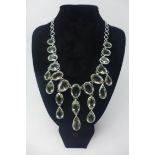 A weighty sterling silver and faceted green amethyst chandelier necklace, L: 60cm, 132g