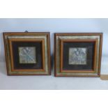 A pair of framed and glazed artworks depicting metallic plaster reliefs of seated ancient Egyptian