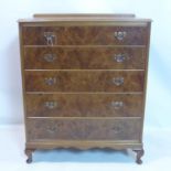 A walnut chest of 5 graduating drawers, on cabriole feet, H.103 W.84 D.48cm