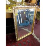 A gilt mirror with bevelled plate, 60 x 87cm