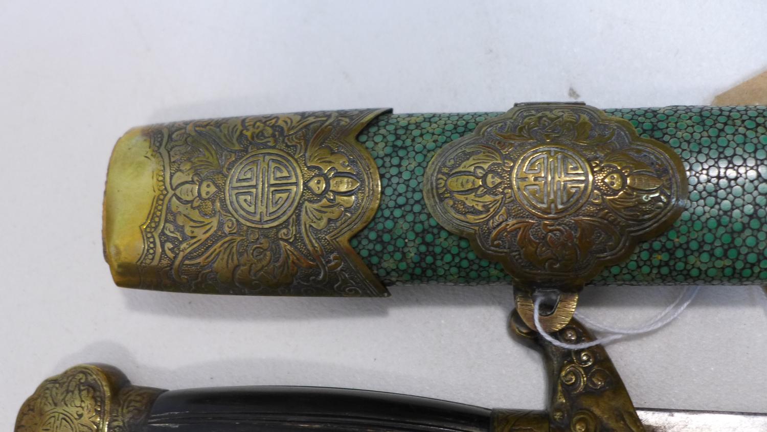 A Chinese late Qing dynasty double sword, with cast brass mounts and horn grip, in shagreen - Image 6 of 8