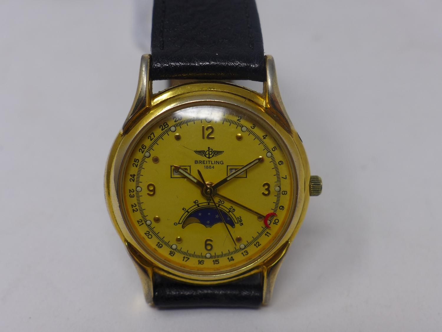 A vintage Breitling gold plated gentleman's wristwatch, yellow dial with alternating Arabic