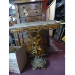 An Italian gilt wood console table with onyx top H: 85, W: 80, D: 31cm