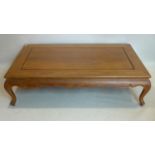 A French walnut coffee table, H.41 W.156 D.95cm