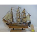 A vintage wooden model of H.M.S Victory, H.45 W.51 D.12cm