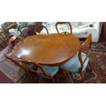 WITHDRAWN - A French walnut dining table and six matching chairs