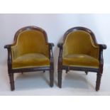 A pair of William IV rosewood armchairs with velours upholstery