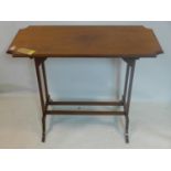 An Edwardian mahogany centre table with moulded top, raised on outswept feet and stretchers, H.79