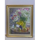 A large mid 20th century, gilt framed oil on canvas of a floral still life composition in front of a