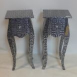 A pair of contemporary bedside tables