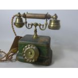 A vintage Italian leather and brass telephone
