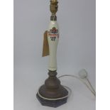 A vintage ceramic beer pump handle converted to a lamp, H.46cm