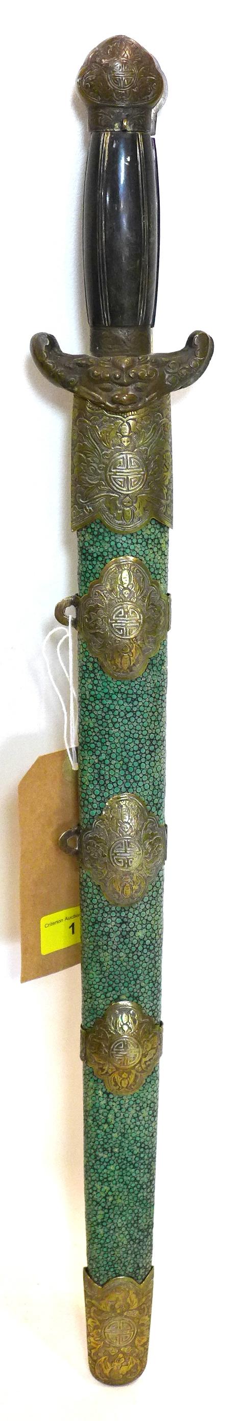 A Chinese late Qing dynasty double sword, with cast brass mounts and horn grip, in shagreen