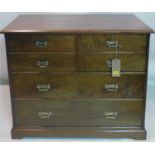 An Art & Crafts walnut chest of five drawers, H.81 W.106 D.52cm
