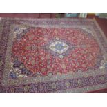 A Central Persian Kashan carpet, central double pendent medallion with repeating petal motifs and