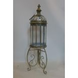 A gilt metal lantern on stand