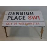 A vintage enamel street sign for Denbich place SW1, converted to a coffee table, H.40 W.74 D.44cm