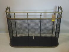 A late 19th/early 20th century brass and mesh fire guard, H.74 W.97 D.37cm