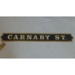 A vintage cast iron street sign for Carnaby street, H.14 W.111cm